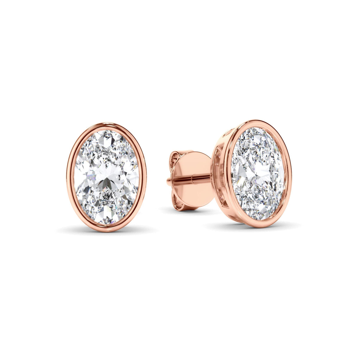 Oval Cut Diamond Bezel Set Stud Earrings