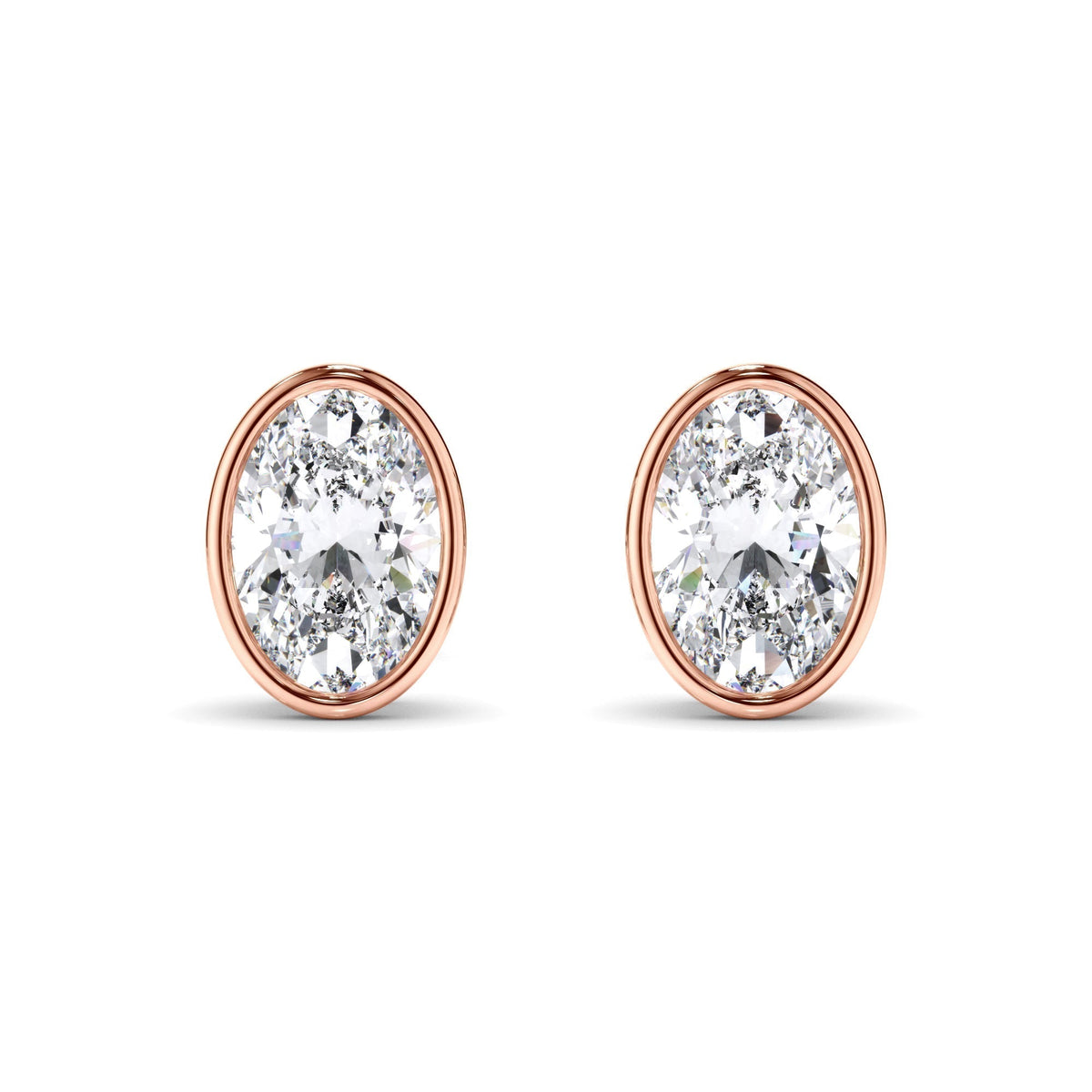 Oval Cut Diamond Bezel Set Stud Earrings