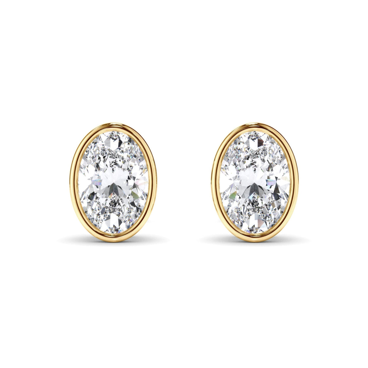 Oval Cut Diamond Bezel Set Stud Earrings